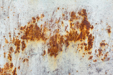White corroded metal background. Rusty and scratched painted metal wall. Rusty metal background with streaks of rust .