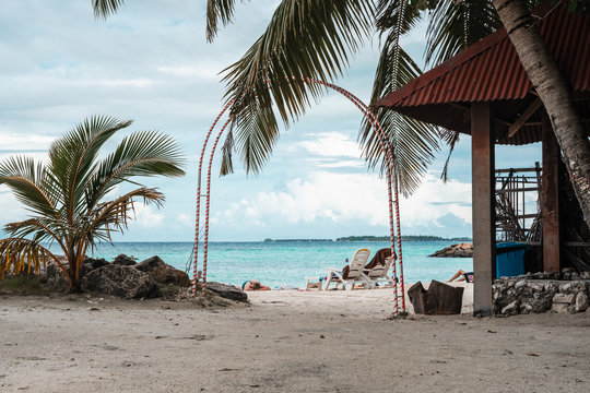 Maafushi Island, Maldives - Gateway entrance to Bikini Beach, a tourist beach where short swimwear and swimsuits are allowed in the Muslim country