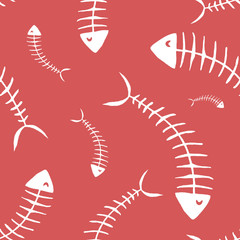 white skeletons of fish on red