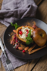 Baked apple with cottage cheese, berries and honey. Healthy dessert