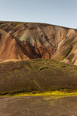 Green stream spring in mountain valley, Landmannalaugar, Iceland