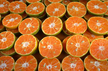 Orange cut into pieces corner on healthy food concept top view image