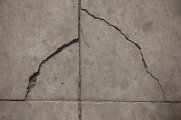 Deep cracks on concrete slab from above