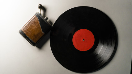Fototapeta premium a flask and vinyl record