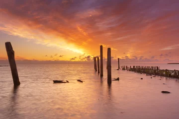 Gardinen Sunrise over sea on the island of Texel, The Netherlands © sara_winter