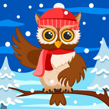Owl in a hat and scarf sits on a branch and waves its wing. Christmas background