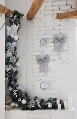 Christmas, New Year silver-white interior, white brick wall background with balls and bows