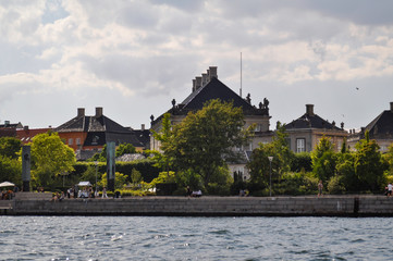 Fototapeta na wymiar Copenhagen Denmark city views during canal boat cruise on cloudy day