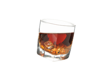 Glass of whiskey with ice cubes isolated on white background