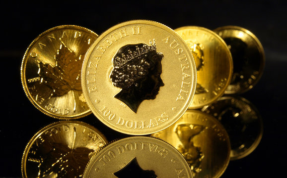 Gold Coins Isolated On Black Background