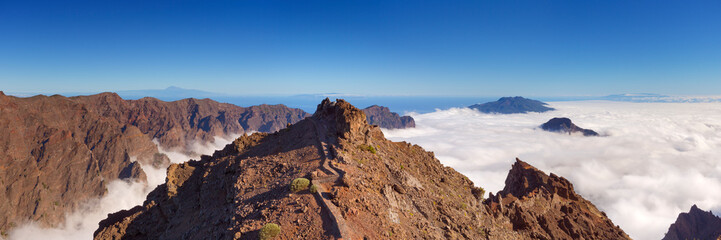 Fototapeta premium Mountain peaks on La Palma above the clouds