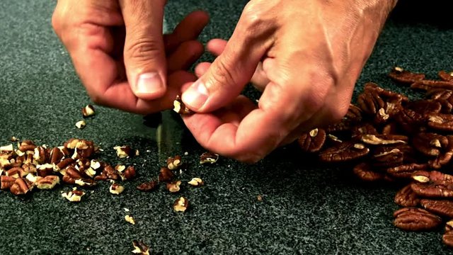 Crushing pecan nuts