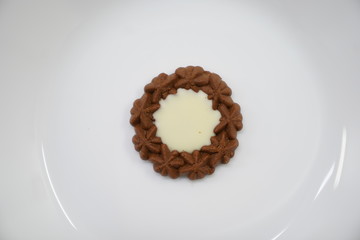 piece of butter cookies on white dish