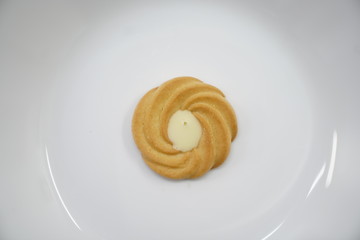 piece of butter cookies on white dish