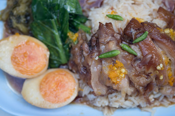 Stewed pork leg on rice with boiled egg