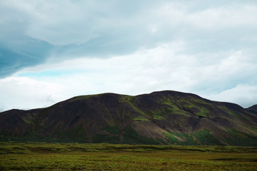 Dark mountains and cloudy skies