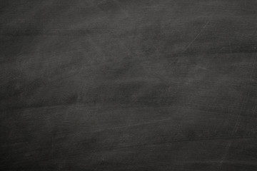 Abstract texture of chalk rubbed out on blackboard or chalkboard, concept for education, back to school, creatively, teaching , etc.