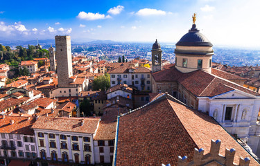Landmarks of northern Italy - medieval Bergamo. panoramic view of old town - obrazy, fototapety, plakaty