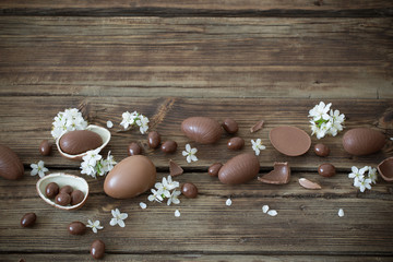 chocolate eggs on dark wooden background