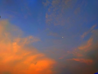 sky with clouds and a star