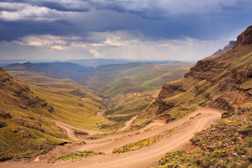 Hairpin turns in the Sani Pass in South Africa - obrazy, fototapety, plakaty