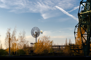 Industrial surroundings at sunset and night