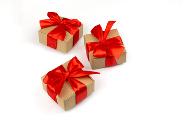 Merry Christmas gift boxes with red bow on a white background isolated minimalism. There is room for text or other design.