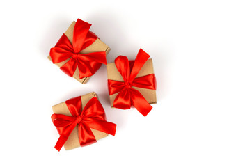 Christmas gift boxes with red bow on a white background isolated minimalism. There is room for text or other design.