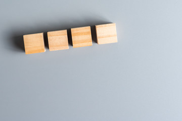 top view of 4 blank wood cube mock up on isolated background for create letter or symbol, business, banner, advertising concept, copy space