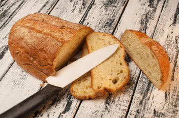 a loaf of corn bread on gray textured background