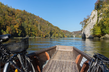 WELTENBURG, BAVARIA / GERMANY - Oct 14, 2019: View from a wooden boat cruising at the danube (Donau). Close to the so-called "Donaudurchbruch" (narrow canyon). Feeling of freedom and adventure.