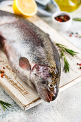Raw rainbow trout light background