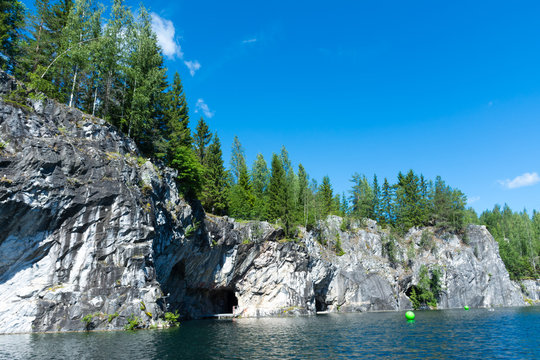 Rocks and lake of marble canyon in Ruskeala