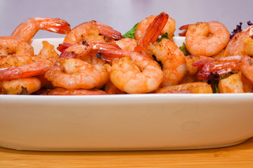 fried shrimp with vegetables and herbs with sauce
