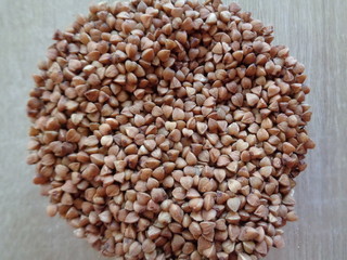 Buckwheat for Breakfast porridge. Whole grains are brown without shell.For garnish or as a separate dish.