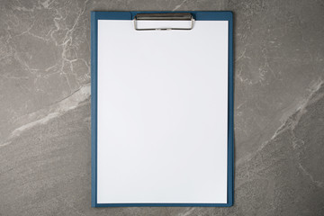 open paper notepad on marble table
