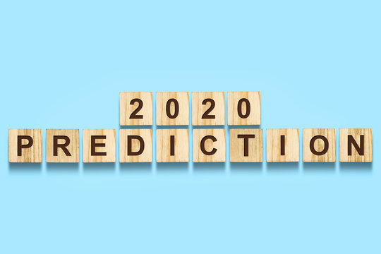 2020. Prediction. Words On Wooden Blocks. Isolated On A Blue Background. Business. Action.