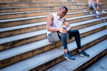 A 31 year old African American man with black skin he is and athlete, currently having a knee...