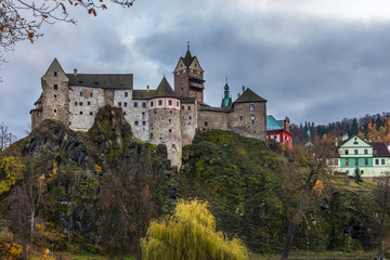 Fototapeta na wymiar Loket town with castle in Czechia at sunset