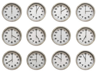 Set of round clocks showing various time, The collection of twelve wall clocks isolated on white...