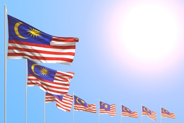 nice any occasion flag 3d illustration. - many Malaysia flags placed diagonal on blue sky with place for your content