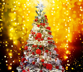 Christmas tree against a glittery luminous background
