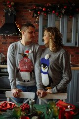 kisses in the kitchen. christmas morning