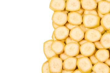 Fresh banana slices background. Top view.