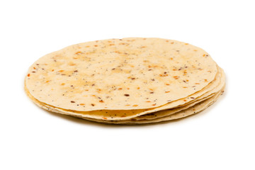 Pitta bread with seeds isolated on white