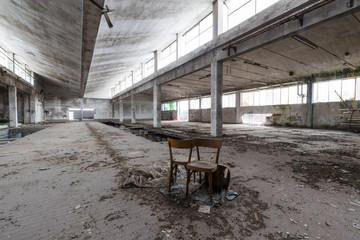 Fototapeta na wymiar Urban exploration in an abandoned textile industry