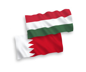 Flags of Bahrain and Hungary on a white background
