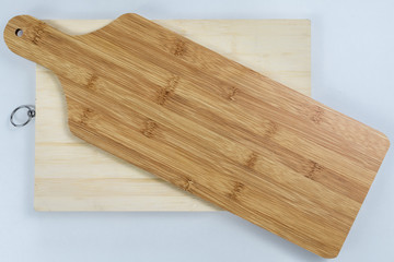 two wooden chopping board