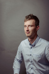 Obraz premium Portrait of a smart serious young man