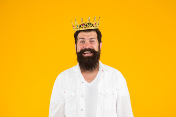 real happiness. hipster man king costume party. brutal and handsome prince yellow background....